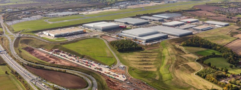 View from above of the cargo airport and its ground access at East Midlands Freeport, one of the UK Freeports.